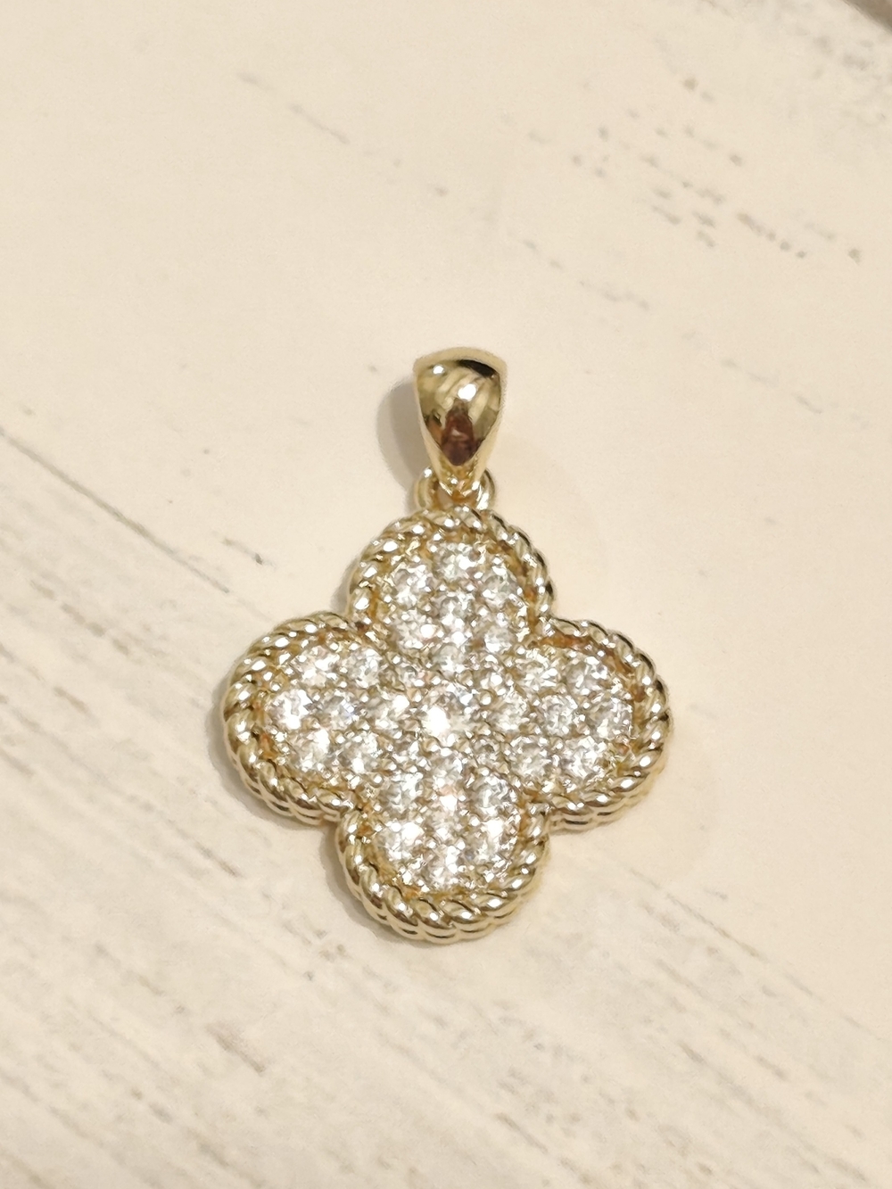 The surface is plated with a thin layer of real gold 14k.